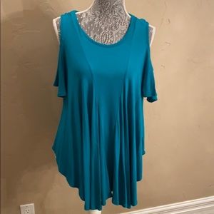 Luxe, very flattering, short sleeved shirt